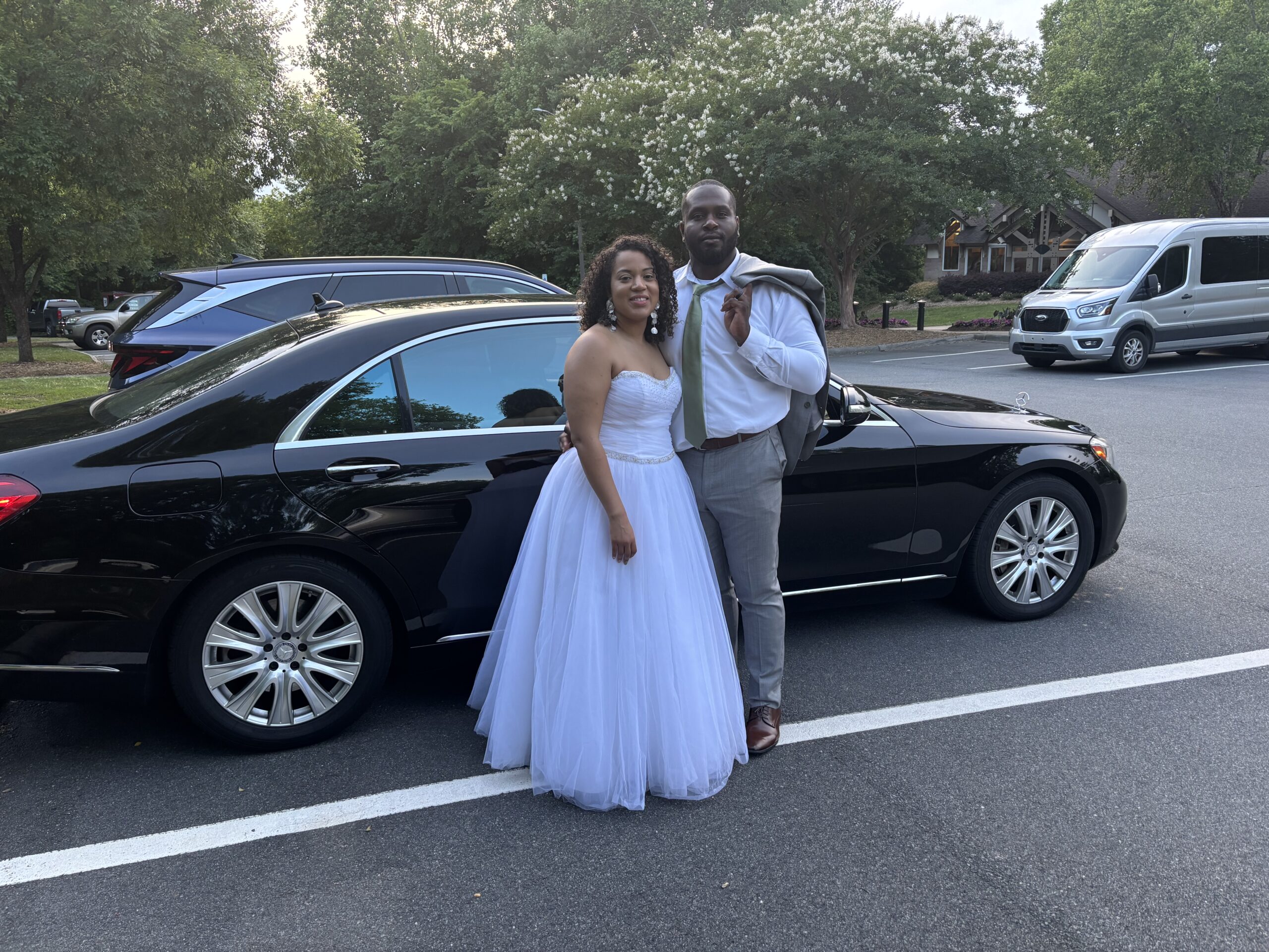 Bride and groom in sedan